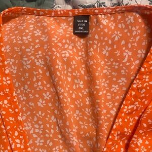 SHEIN Vibrant Orange Dress with White Floral Design